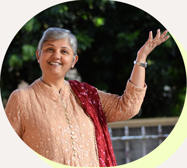 Kavita Ramchand smiling and waving